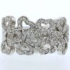Impresionante anillo de oro de 18 quilates con múltiples motivos en forma de corazón adornados con brillantes diamantes. Perf.