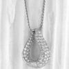 Elegant 18K gold pendant with pave-set diamonds, perfect for luxury jewelry collection.