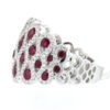 Elegant white gold ring featuring natural red rubies and sparkling diamonds, inspired by stylish jew.