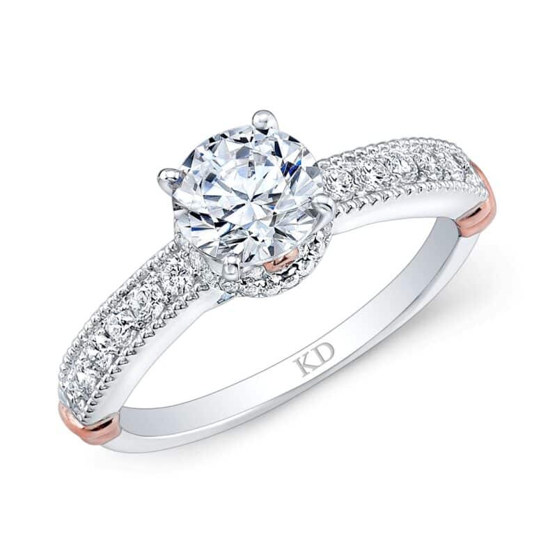 Elegant diamond engagement ring with pavé band and solitaire center stone.