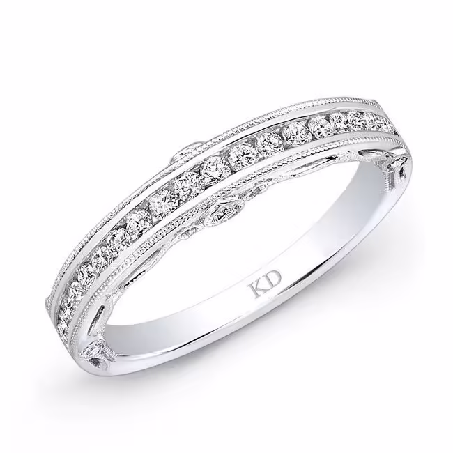 Diamond ring with sparkling stones and a polished silver finish.