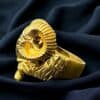 Custom gold ram ring crafted over sterling silver, unique jewelry piece.
