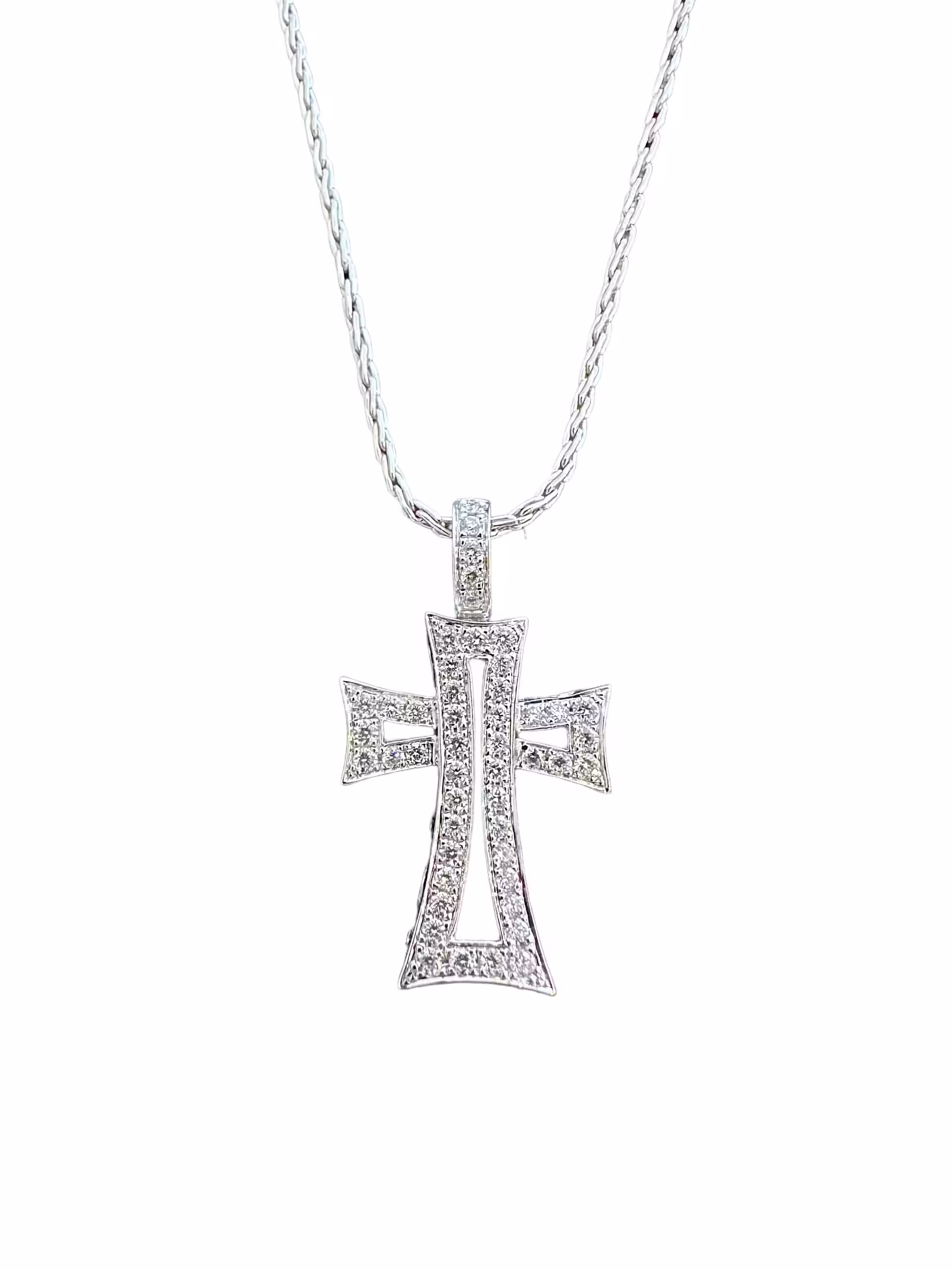 Elegant diamond cross pendant necklace with sparkling stones on a silver chain.