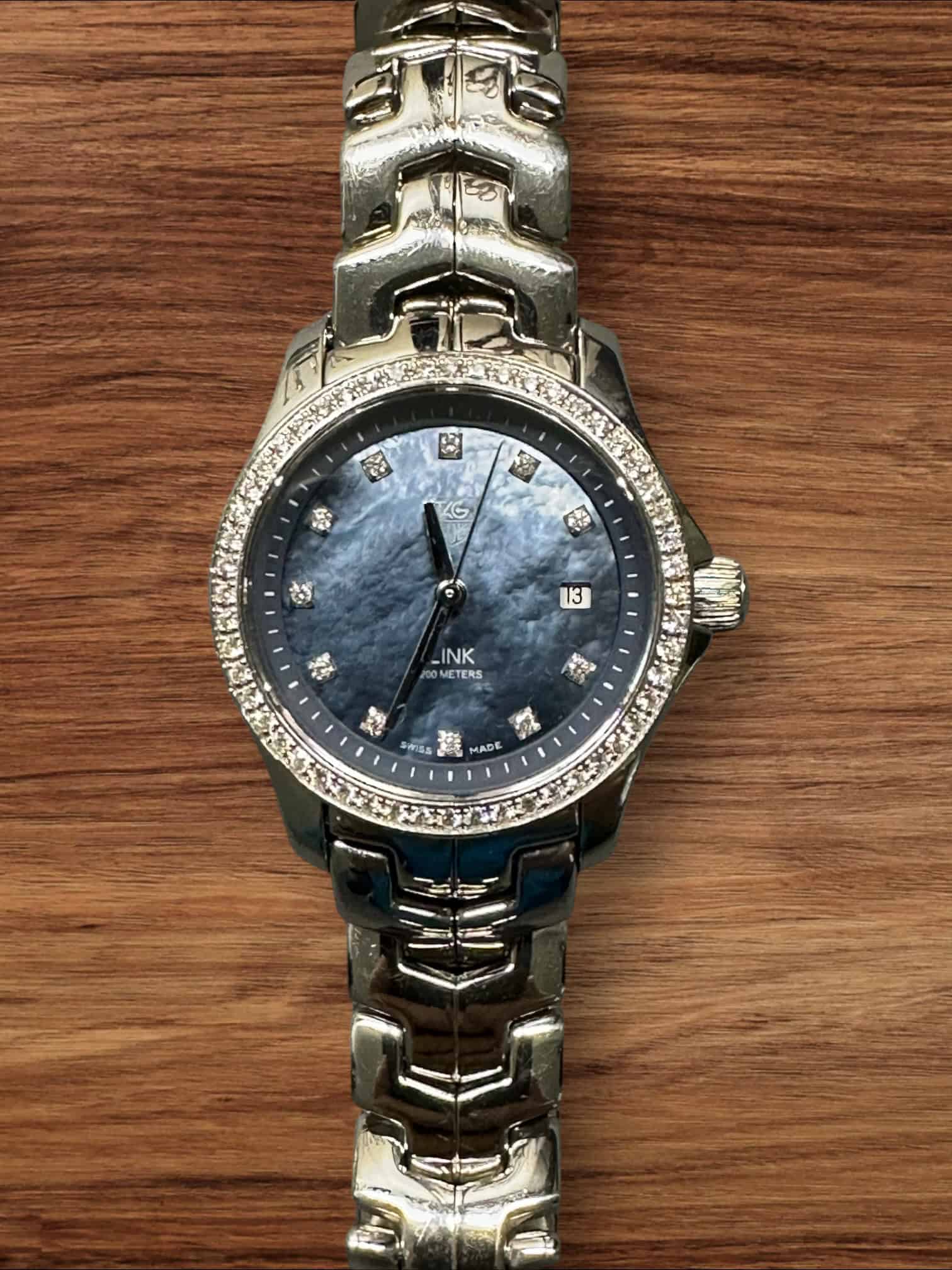Link Ladies watch with diamond accents and blue mother-of-pearl dial.