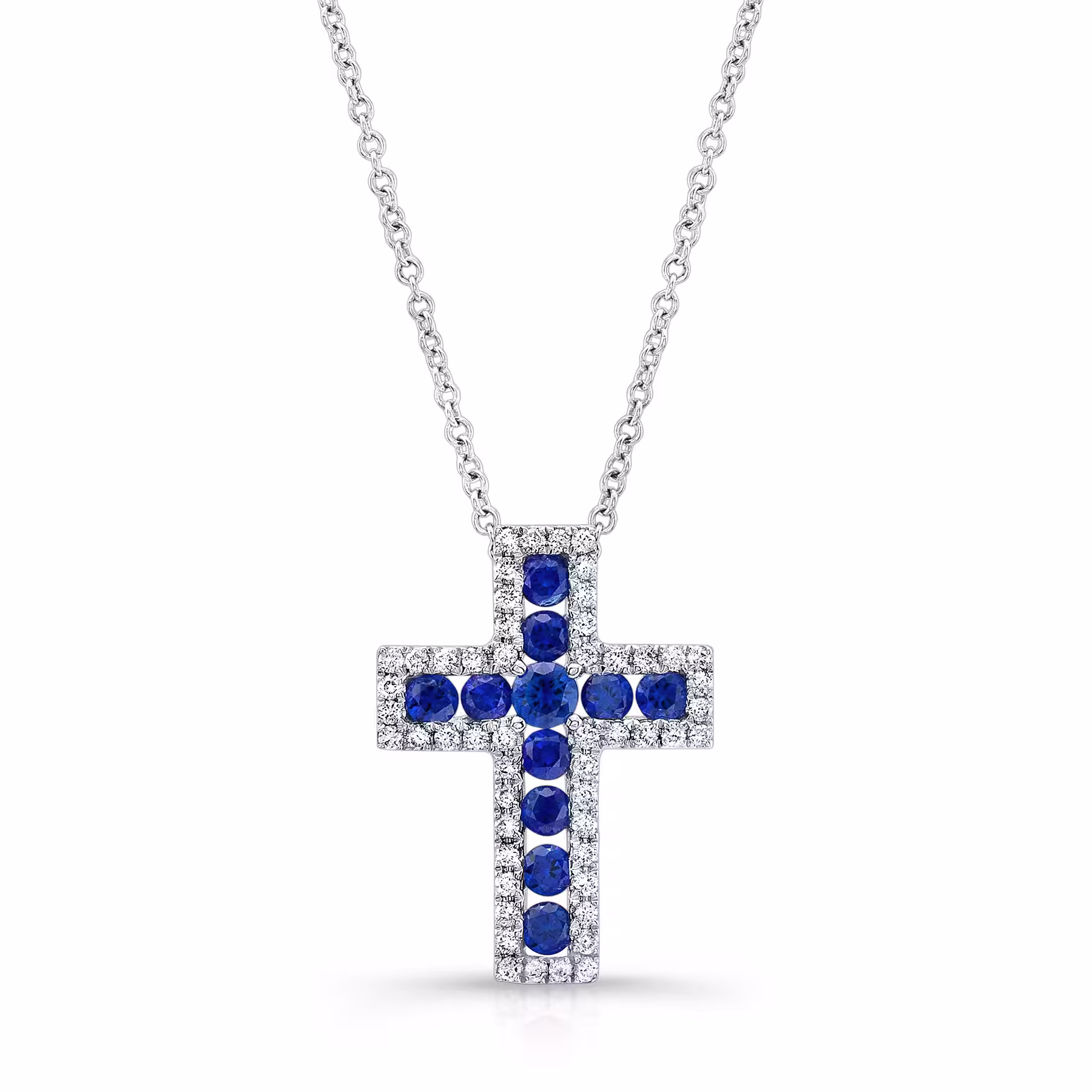 Elegant white gold sapphire cross necklace with diamonds.
